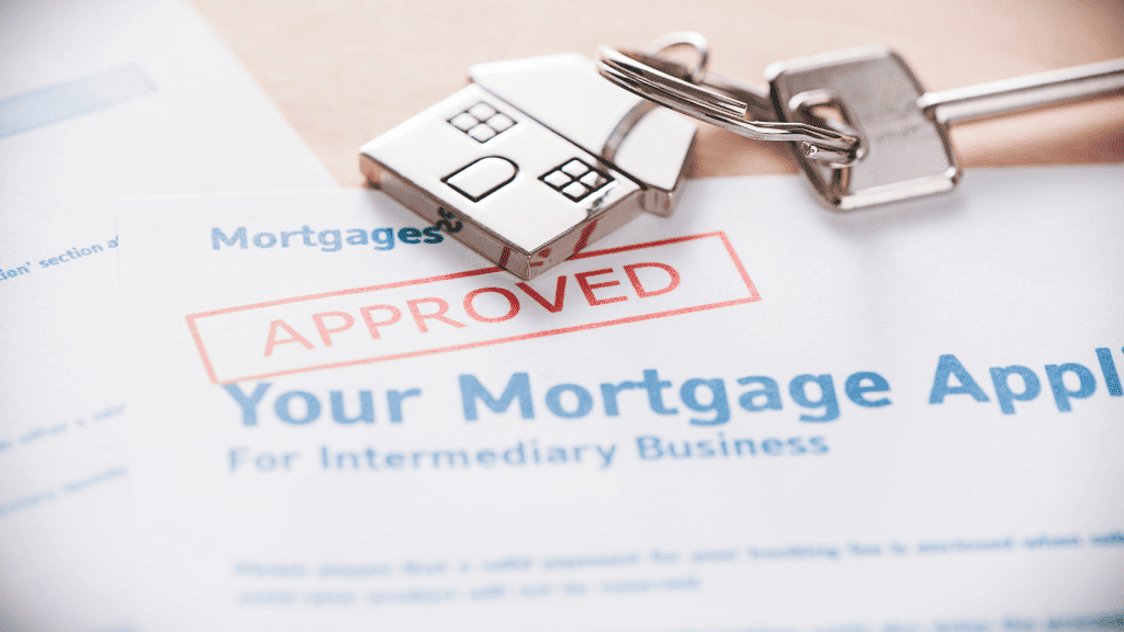 Mortgage documents with house keys